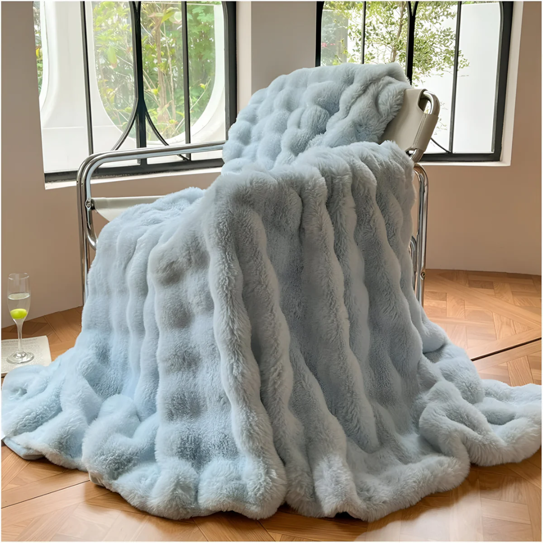Mila Comfort Soft Fleece Throw Blanket with a focus on warmth and comfort at home.